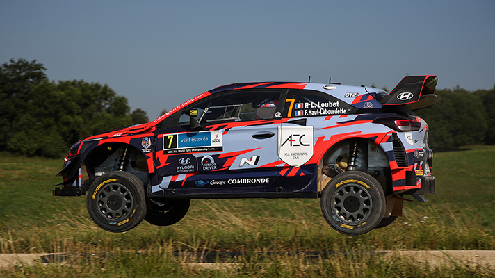 Side of a WRC rally car floating in the air