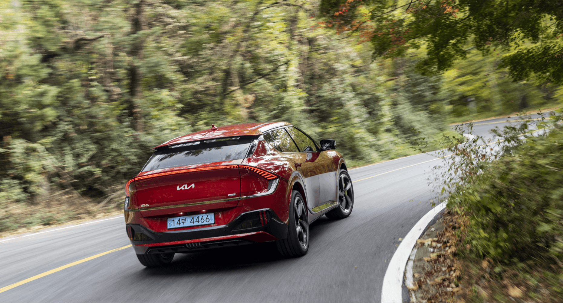 EV6 GT driving down a winding road