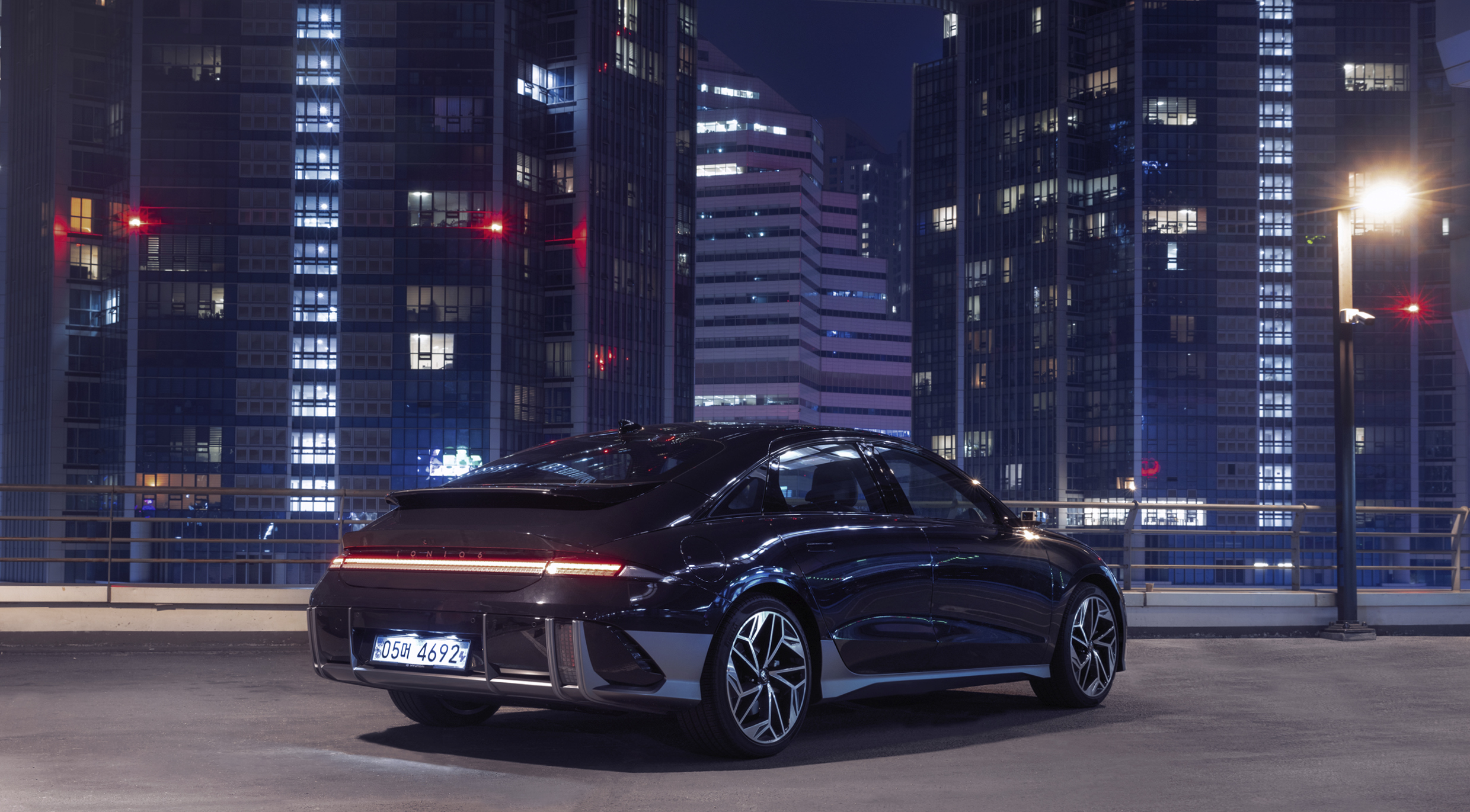 IONIQ 6 in the middle of skyscrapers in Seoul