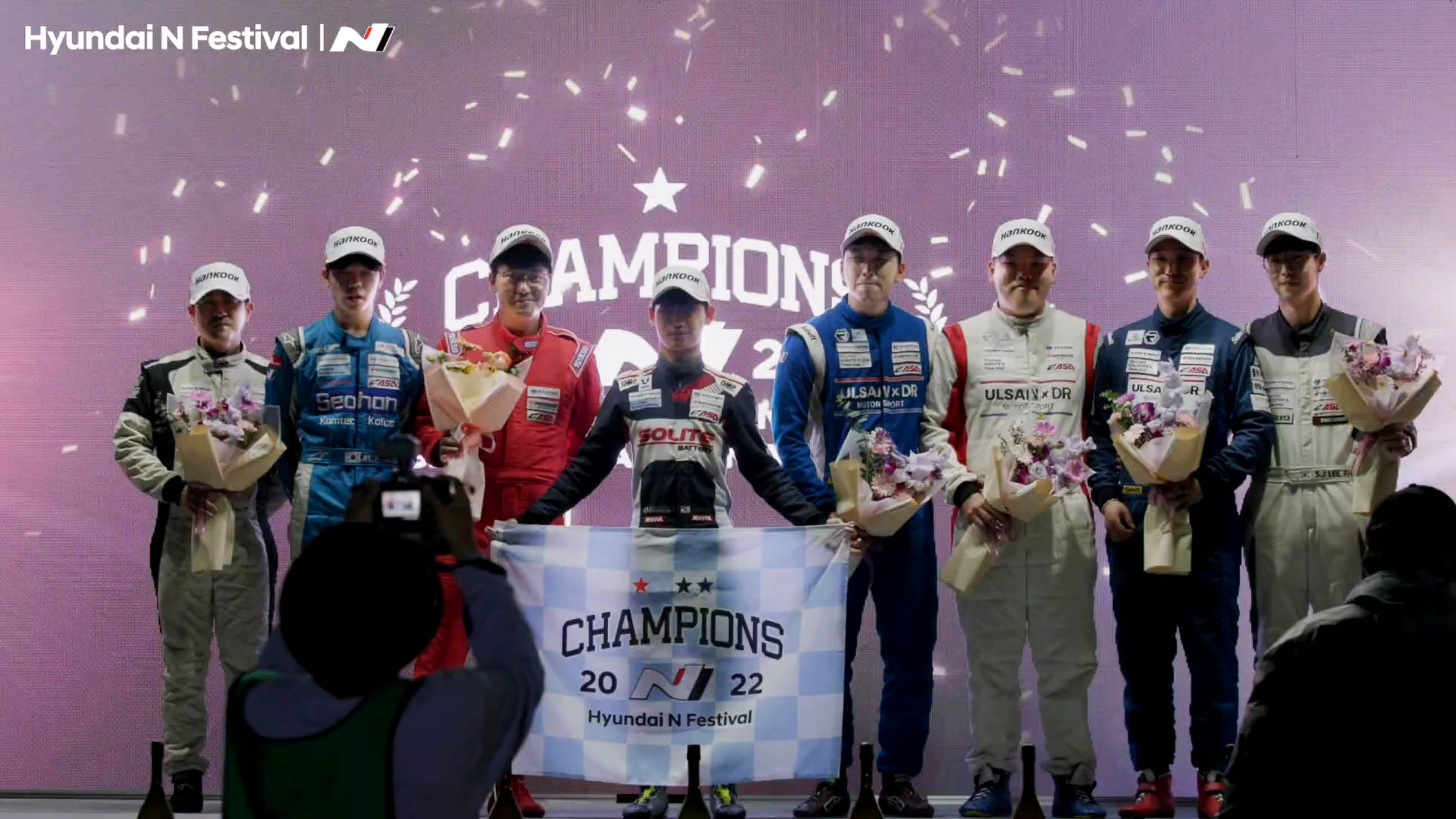 Drivers gathered at the awards ceremony after the race