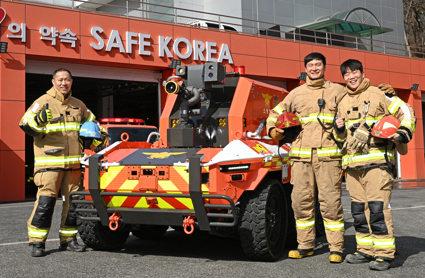 Unmanned firefighting robots and firefighters