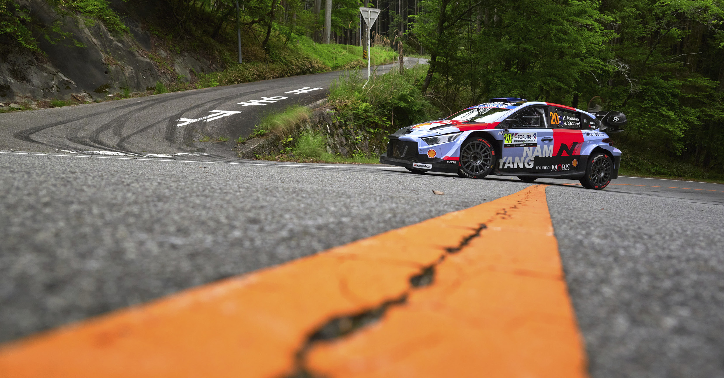 The Hyundai team WRC1 rally car is on the road