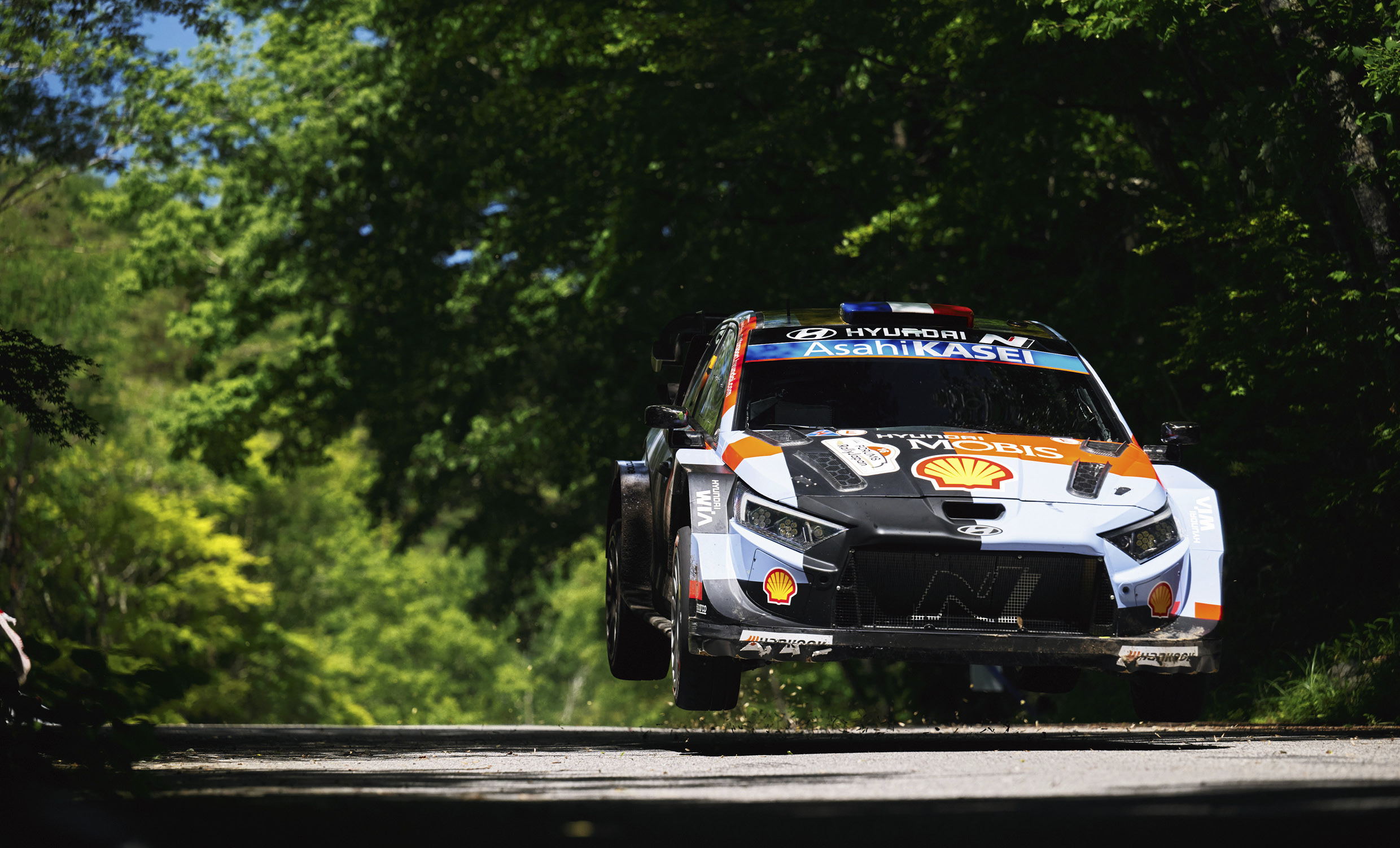 The Hyundai team WRC1 rally car is on the road