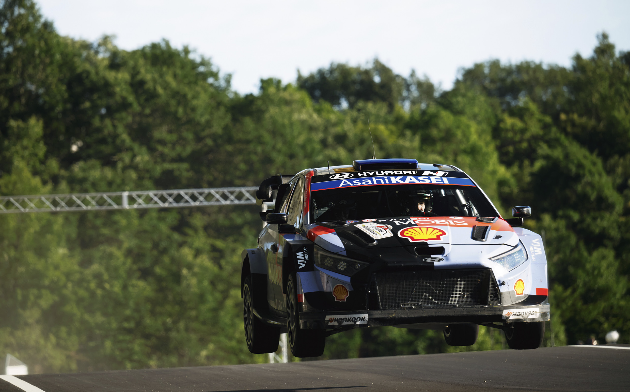 The Hyundai team WRC1 rally car is on the road