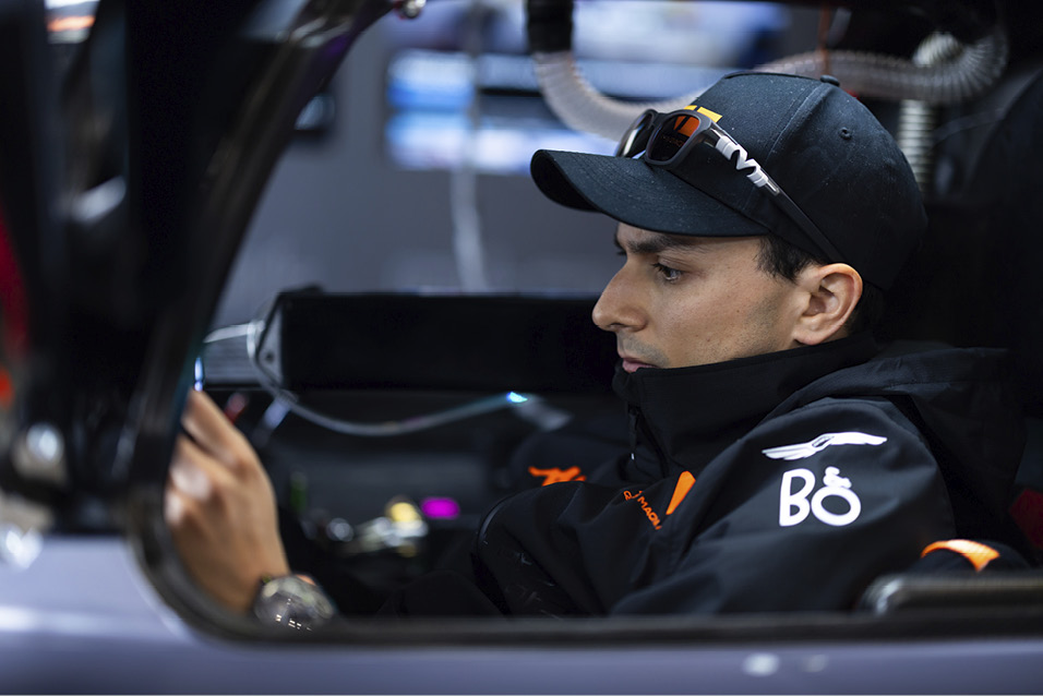 Pipo Derani sitting in a race car