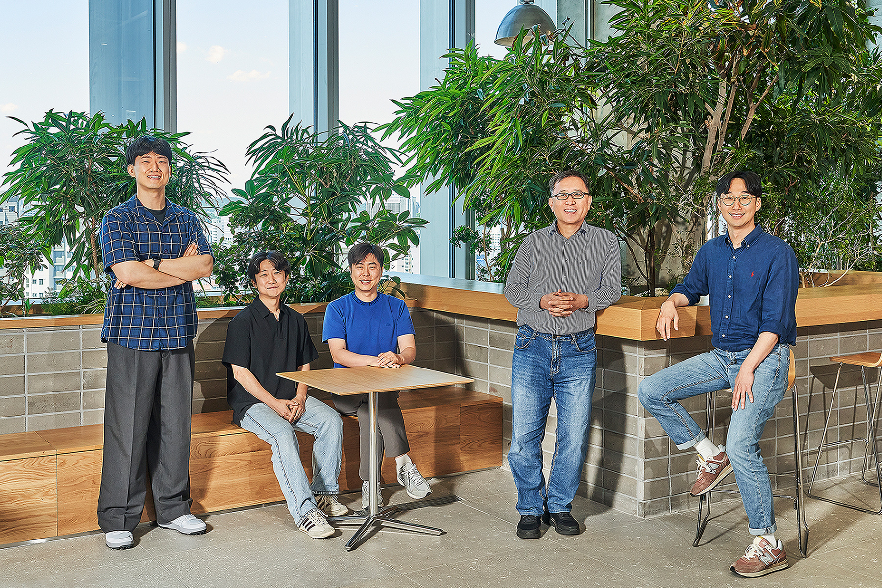 Hyundai Conversion+ development team members posing for a group photo