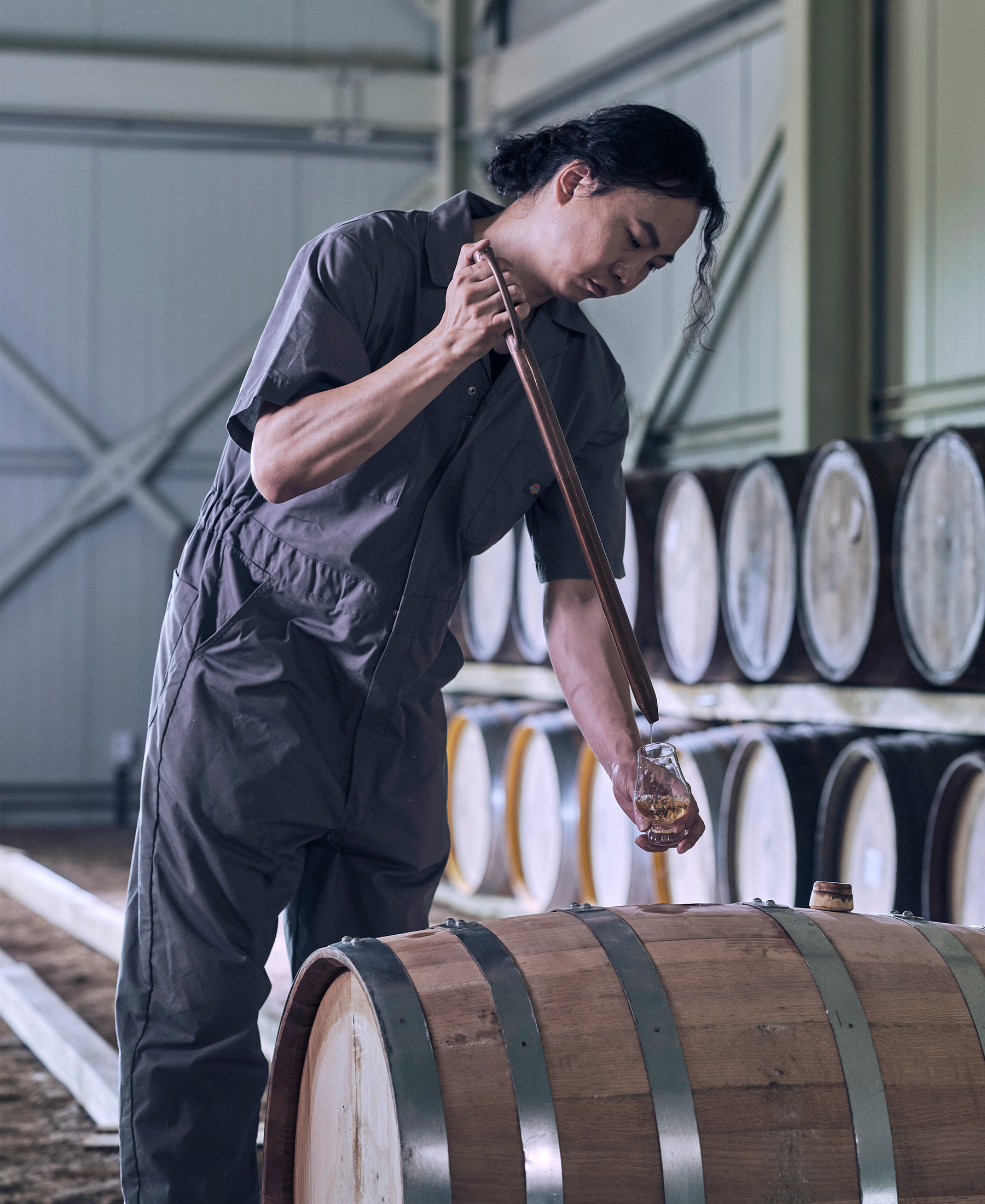 CEO Changsoo Kim working at the whisky production facility