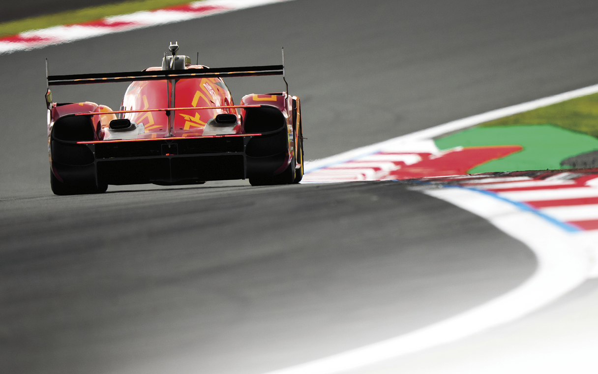 Genesis race car driving on a circuit