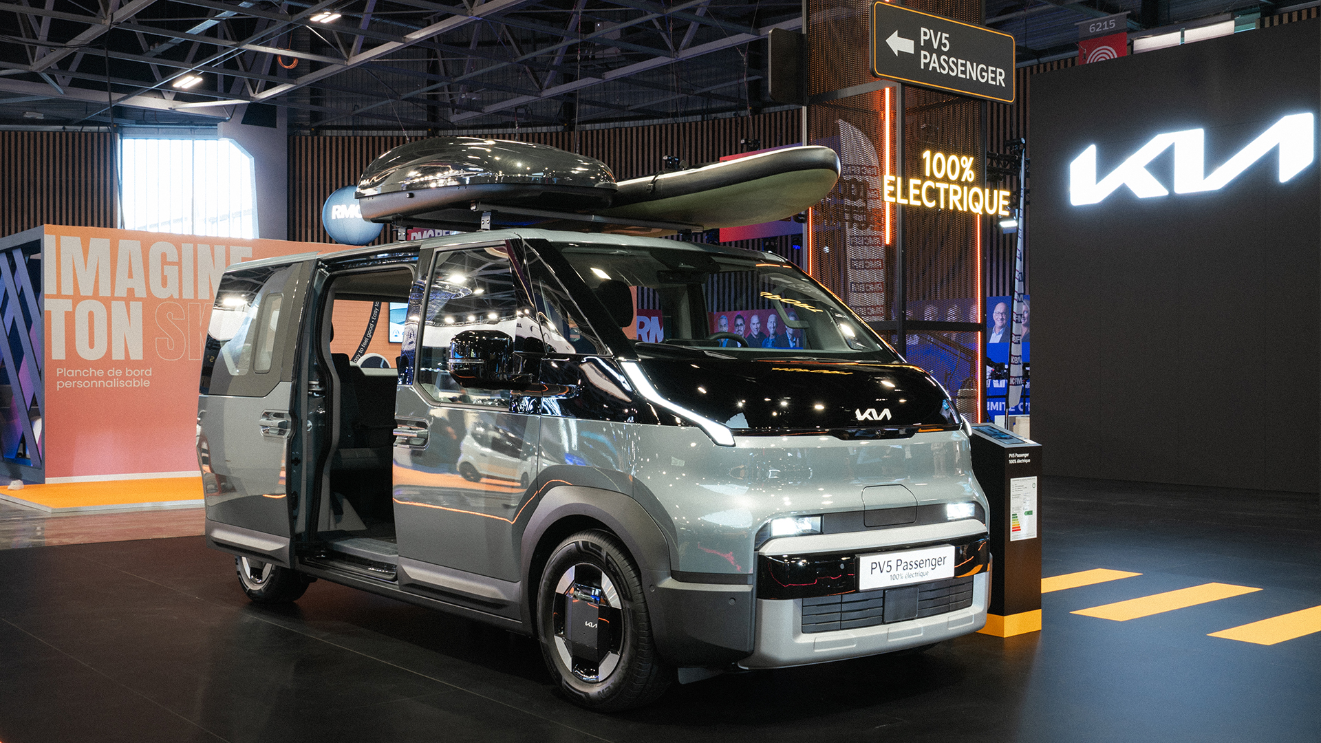 Kia PV5 vehicle displayed at the 2026 Paris Motor Show exhibition hall